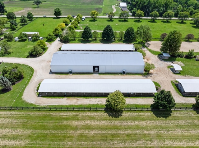 birds eye view of property featuring a rural view