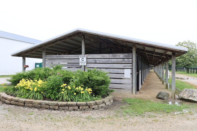 exterior space featuring an outbuilding