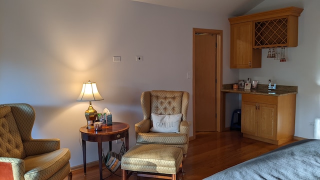 living area featuring hardwood / wood-style floors