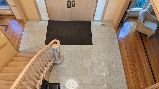 foyer with tile patterned flooring