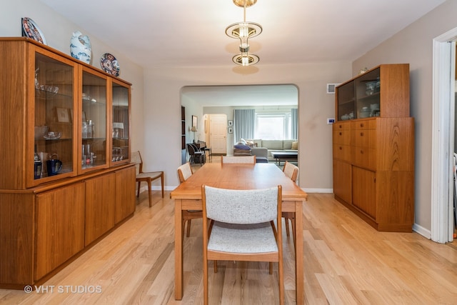 dining space featuring light hardwood / wood-style floors