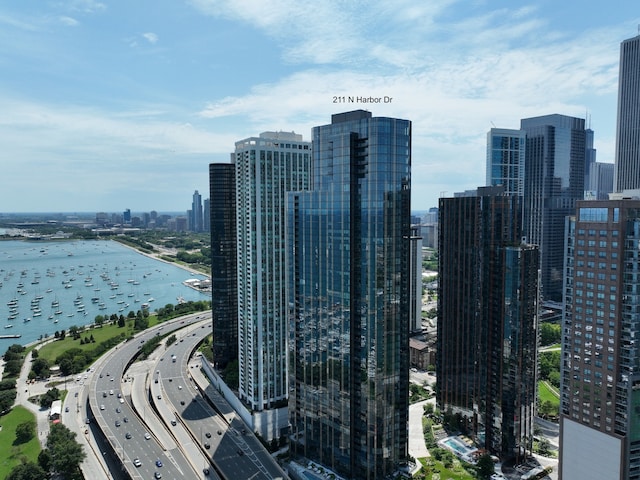 property's view of city with a water view