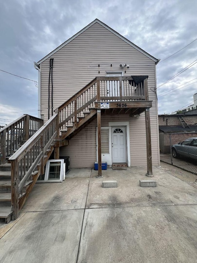 rear view of house with a patio