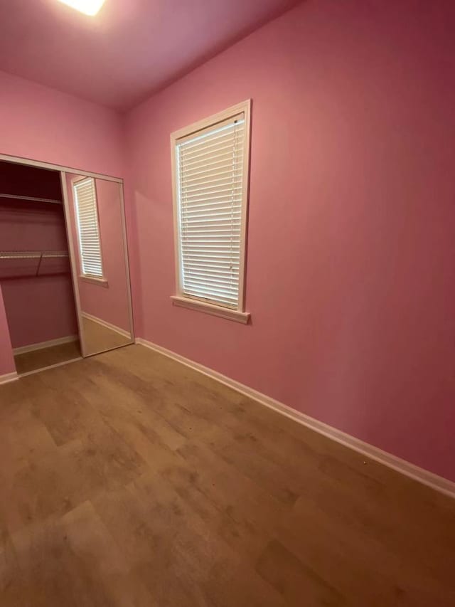 unfurnished bedroom featuring a closet