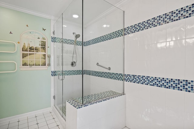 bathroom with tile patterned floors, an enclosed shower, and crown molding