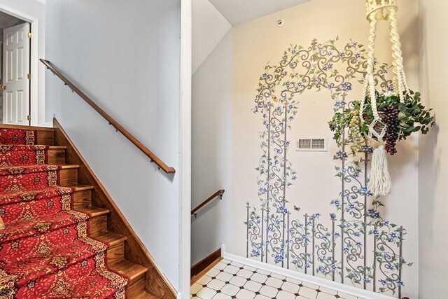 corridor featuring crown molding and light wood-type flooring