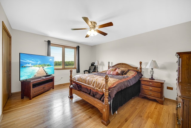 bedroom featuring light wood-type flooring and ceiling fan