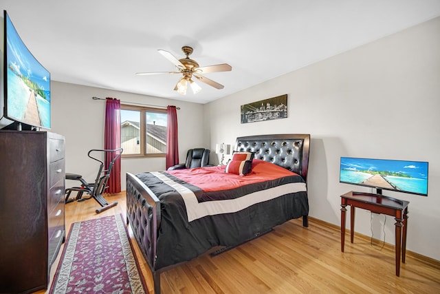 bedroom featuring ceiling fan and light wood-type flooring