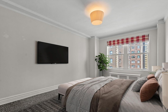 bedroom featuring carpet floors and crown molding