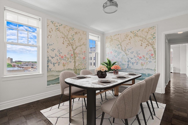 dining room with ornamental molding and dark parquet flooring