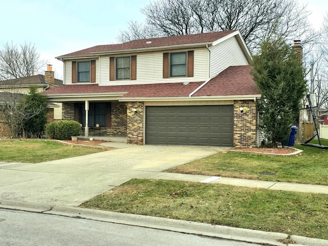 front of property with a front yard and a garage