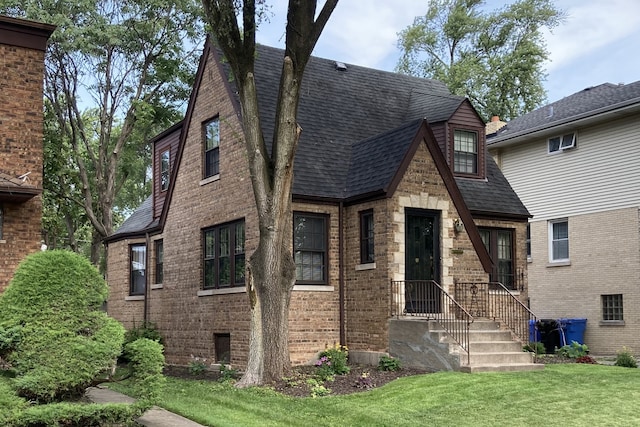 view of home's exterior featuring a lawn