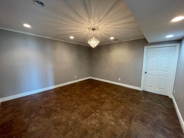 empty room with an inviting chandelier and crown molding