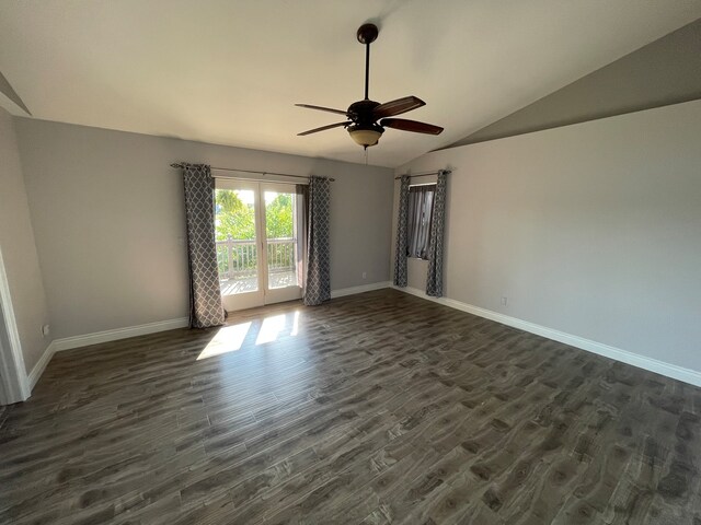 empty room with lofted ceiling, dark hardwood / wood-style floors, french doors, and ceiling fan