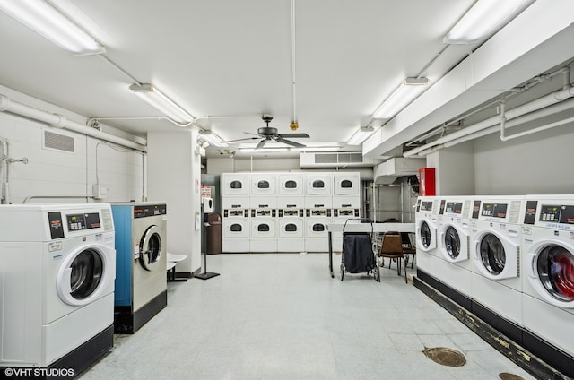 laundry room featuring stacked washer / drying machine, washer and dryer, light tile patterned floors, and ceiling fan