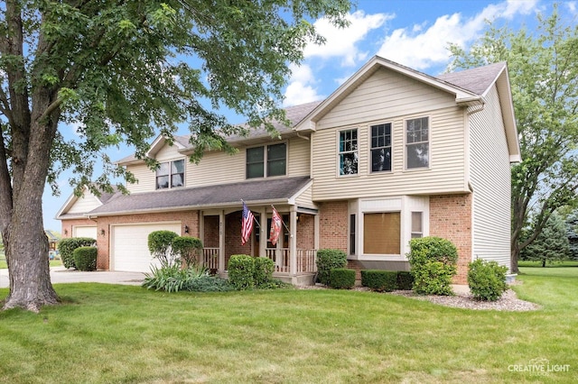 view of front facade with brick siding, covered porch, concrete driveway, and a front yard