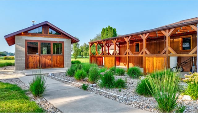 view of property's community with an outdoor structure