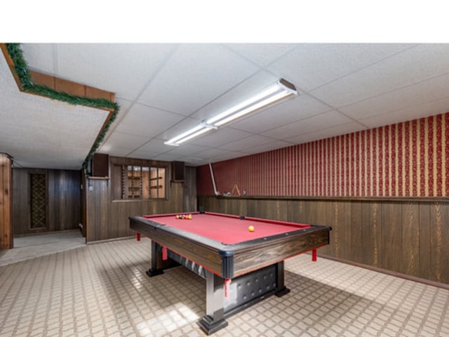 playroom featuring pool table, wainscoting, a drop ceiling, and wooden walls