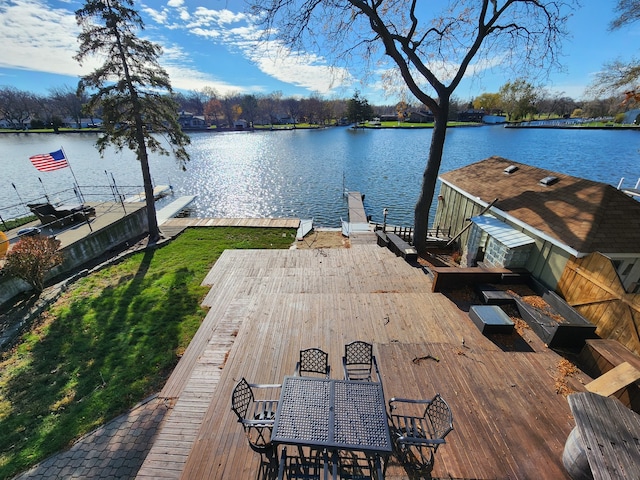 dock area with a water view