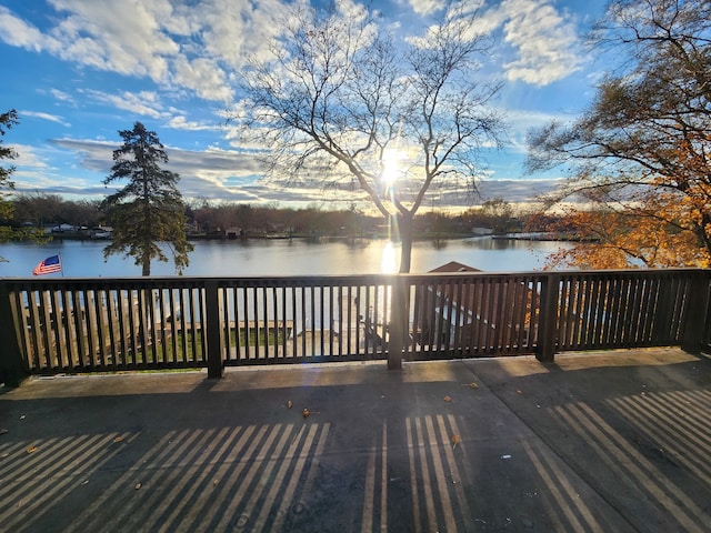 deck featuring a water view