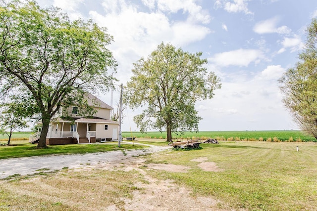 view of yard with a porch