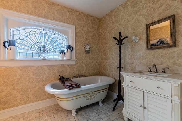 bathroom featuring a bath and vanity