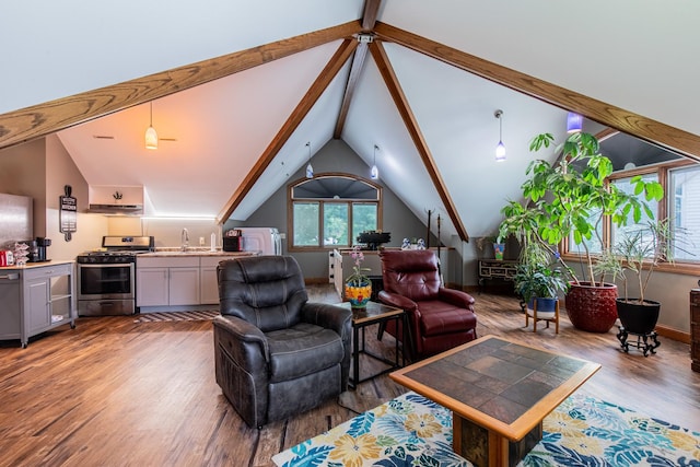 living room with sink, wood-type flooring, and vaulted ceiling with beams