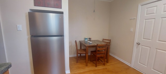 dining area featuring light hardwood / wood-style flooring