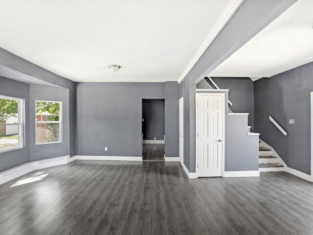 6602 Kennedy Ave, Hammond, IN 46323 - unfurnished living room with stairway, dark wood-style floors, baseboards, and baseboard heating