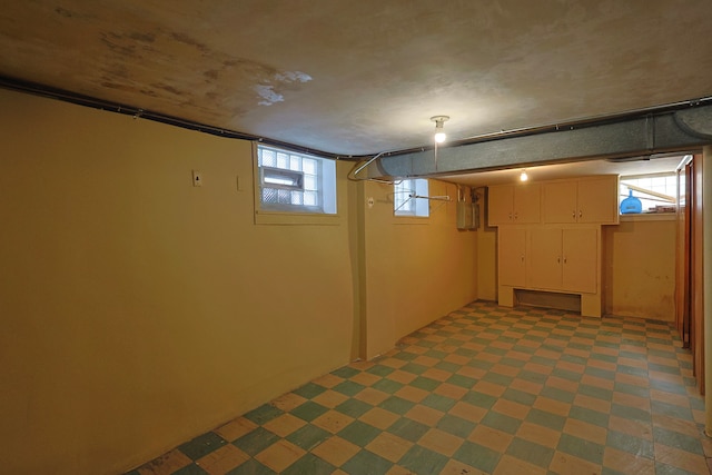 basement featuring carpet flooring