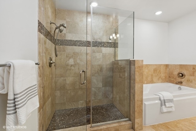 bathroom with plus walk in shower and tile patterned floors