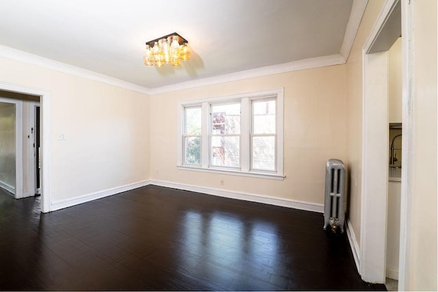 empty room with crown molding, dark wood-type flooring, radiator, and a chandelier