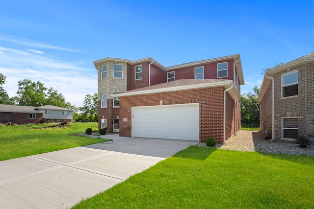 view of front of house with a garage and a front yard