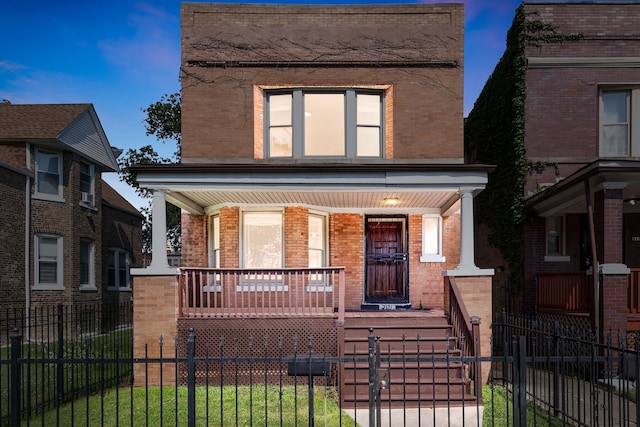 view of front of home featuring covered porch