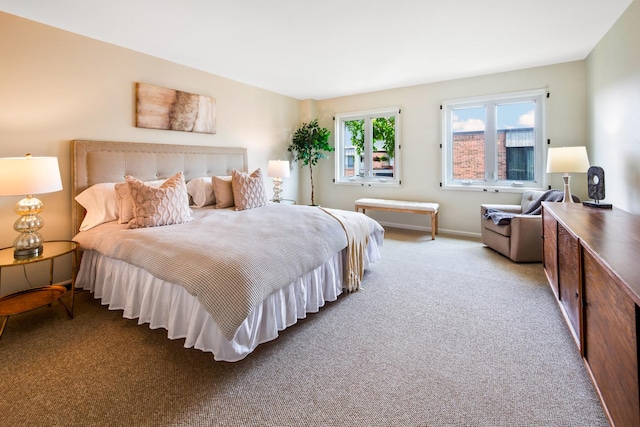 bedroom featuring light colored carpet