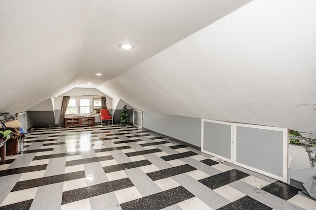 bonus room featuring vaulted ceiling