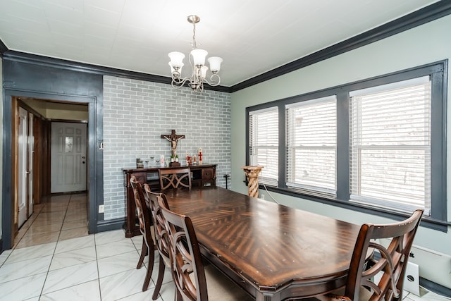 dining room featuring light tile patterned flooring, crown molding, brick wall, and an inviting chandelier