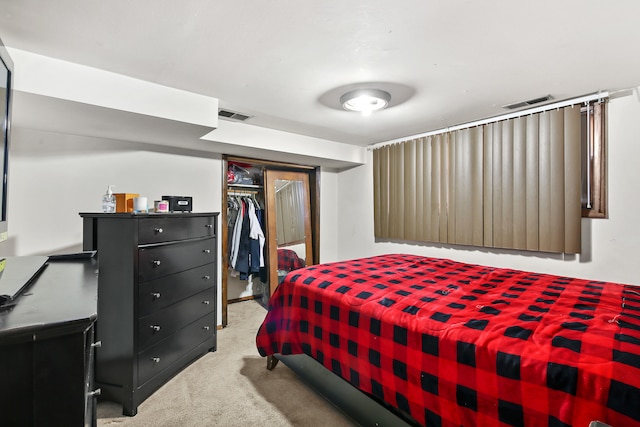 carpeted bedroom with a closet