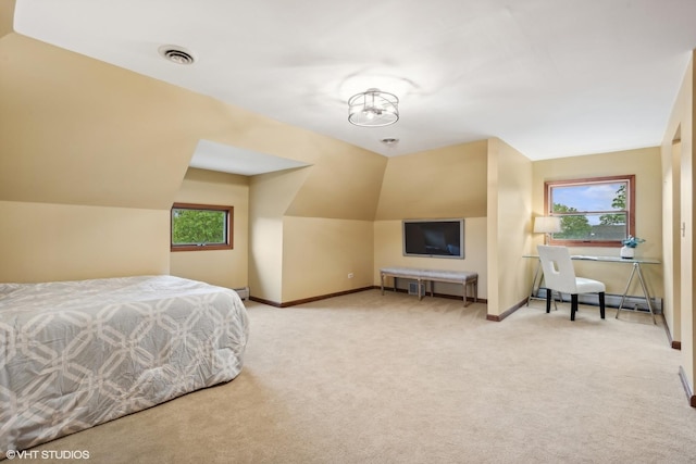 bedroom with lofted ceiling, light colored carpet, visible vents, and baseboards