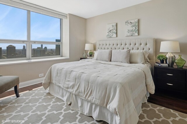 bedroom featuring hardwood / wood-style floors