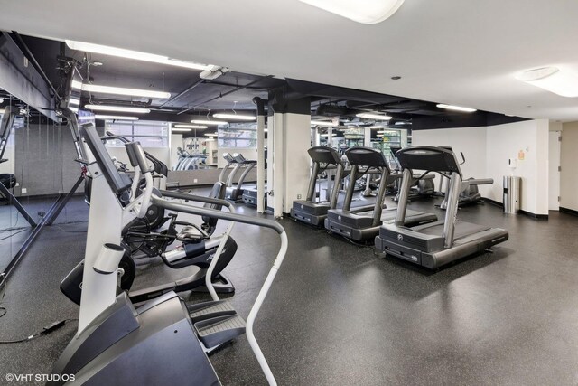 workout area featuring plenty of natural light