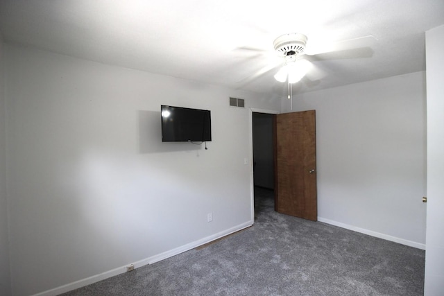 carpeted empty room with ceiling fan