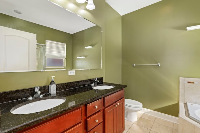 full bathroom featuring vanity, toilet, tile patterned floors, and shower with separate bathtub