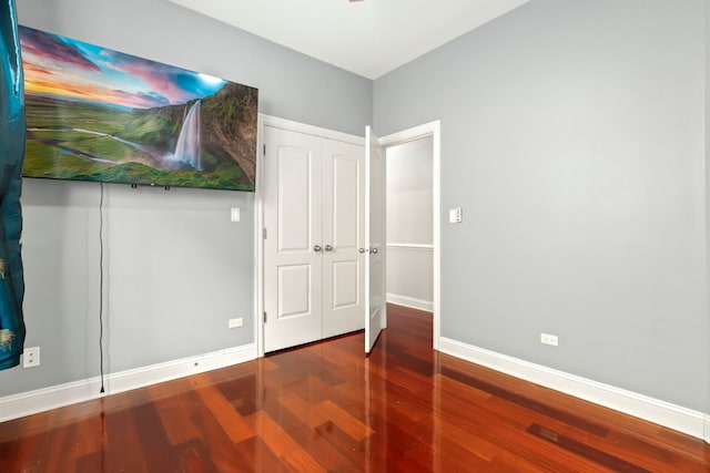 bedroom with hardwood / wood-style flooring