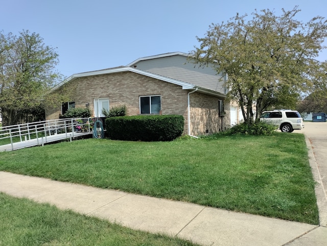 view of property exterior with a yard