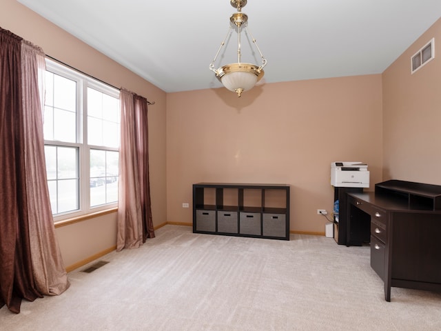 office area featuring a healthy amount of sunlight and light colored carpet