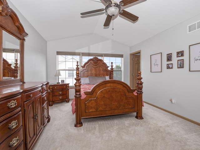 bedroom with lofted ceiling, baseboards, visible vents, and light colored carpet