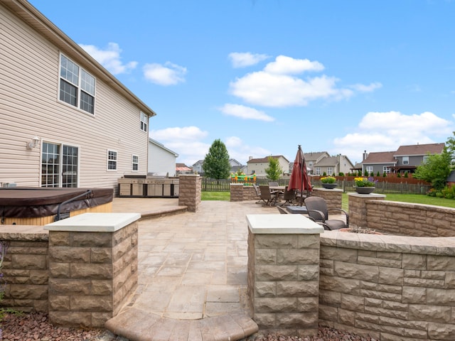 view of patio featuring a hot tub