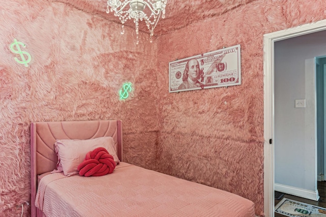 bedroom with a chandelier