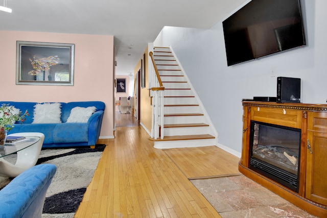 living room with light hardwood / wood-style flooring